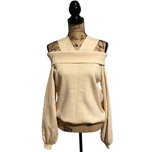 Cream colored knit top